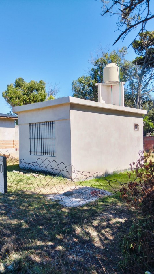 EN VENTA TERRENO CON CONSTRUCCION UN AMBIENTE CON BAÑO