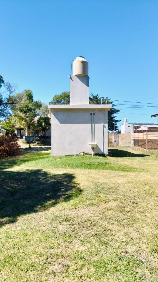 EN VENTA TERRENO CON CONSTRUCCION UN AMBIENTE CON BAÑO