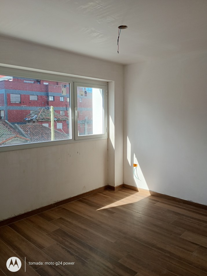 VENTA DEPARTAMENTO 2 AMBIENTES CON COCHERA FRENTE 