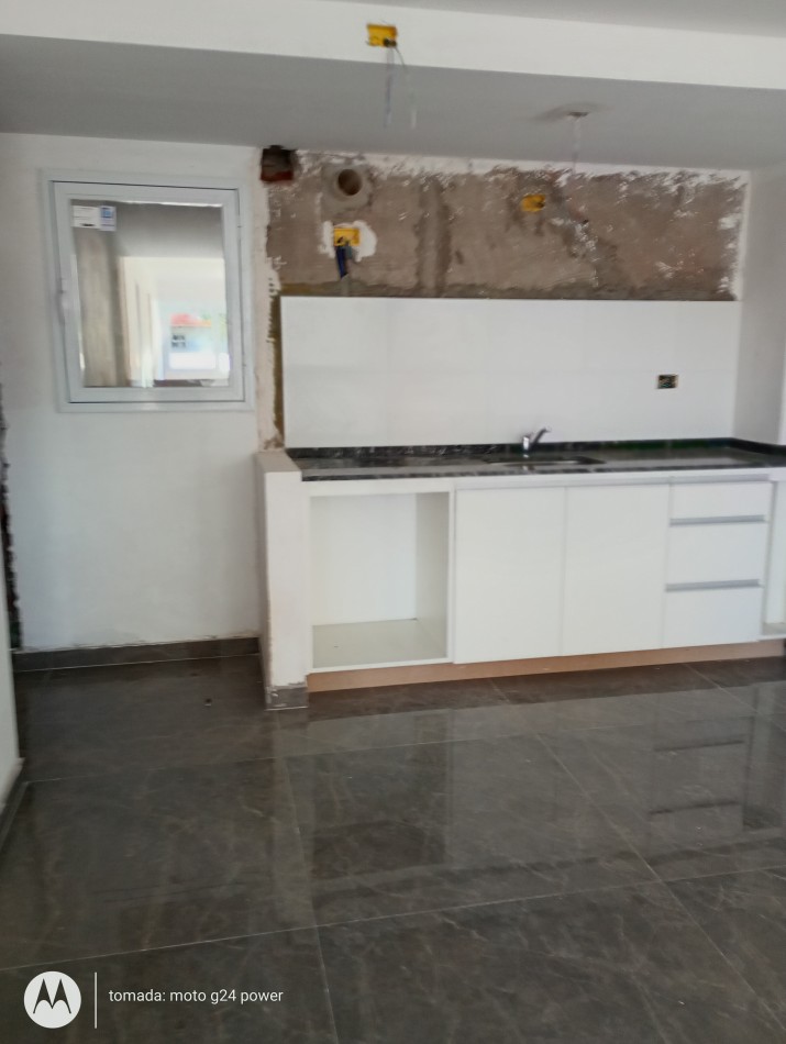 VENTA DEPARTAMENTO 2 AMBIENTES CON COCHERA FRENTE 