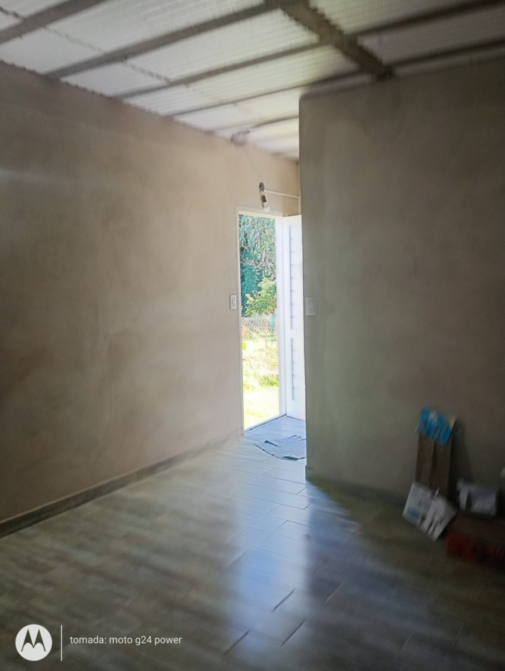 EN VENTA TERRENO CON CONSTRUCCION UN AMBIENTE CON BAÑO