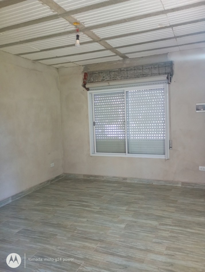 EN VENTA TERRENO CON CONSTRUCCION UN AMBIENTE CON BAÑO