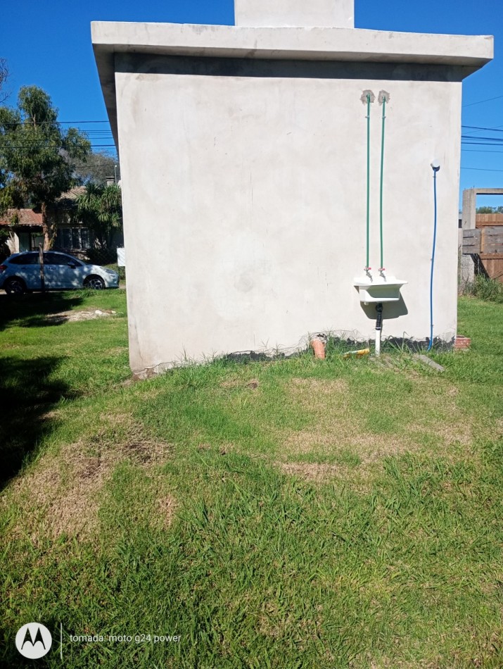 EN VENTA TERRENO CON CONSTRUCCION UN AMBIENTE CON BAÑO